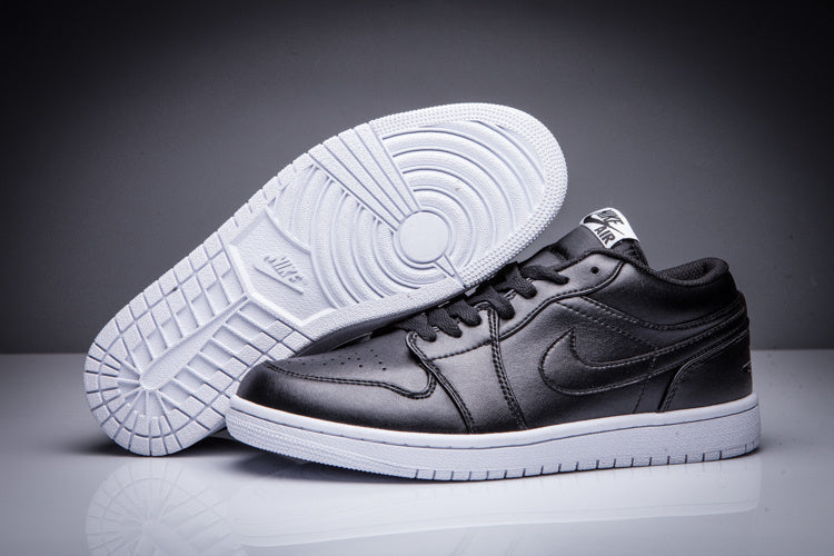 Air Jordan 1 Low Black and White Sneakers - product image from the listing.