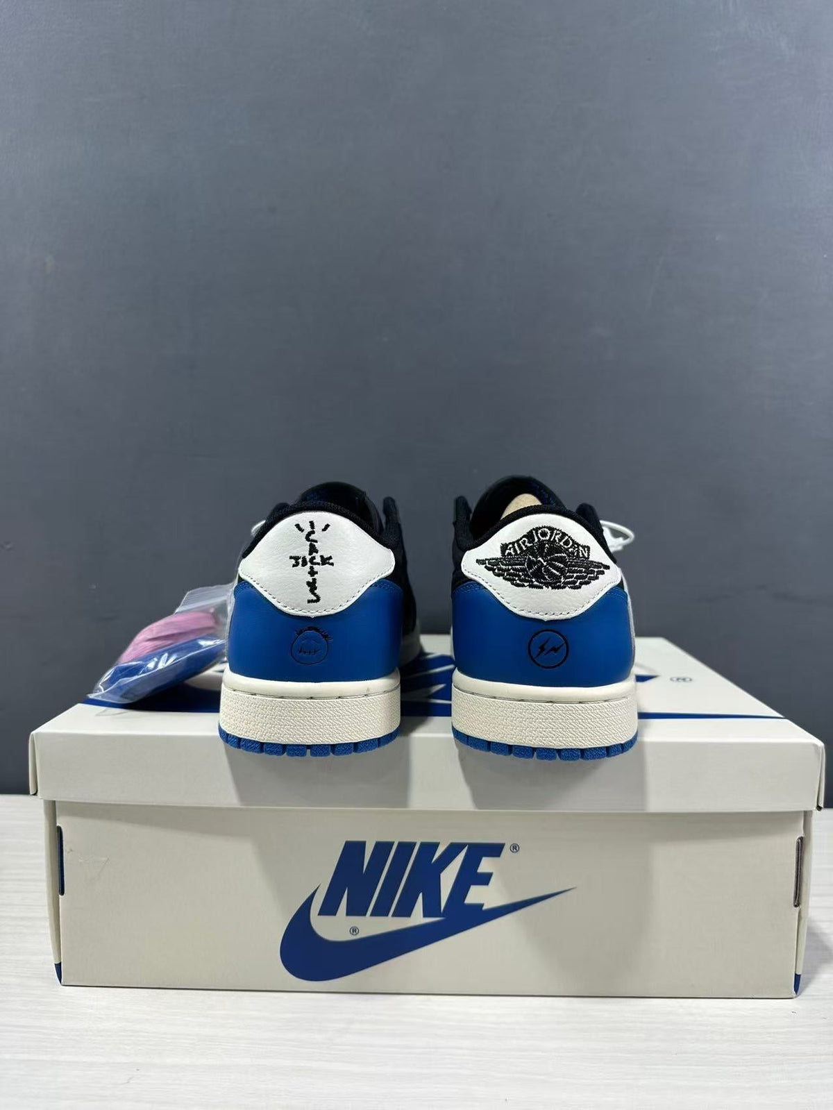 Air Jordan 1 Low Travis Scott Fragment Black Blue Sneakers - product image from the listing.
