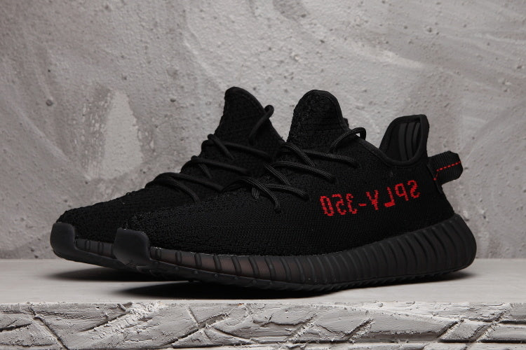 adidas Yeezy Boost 350 V2 Sneakers in Black - product image from the listing.