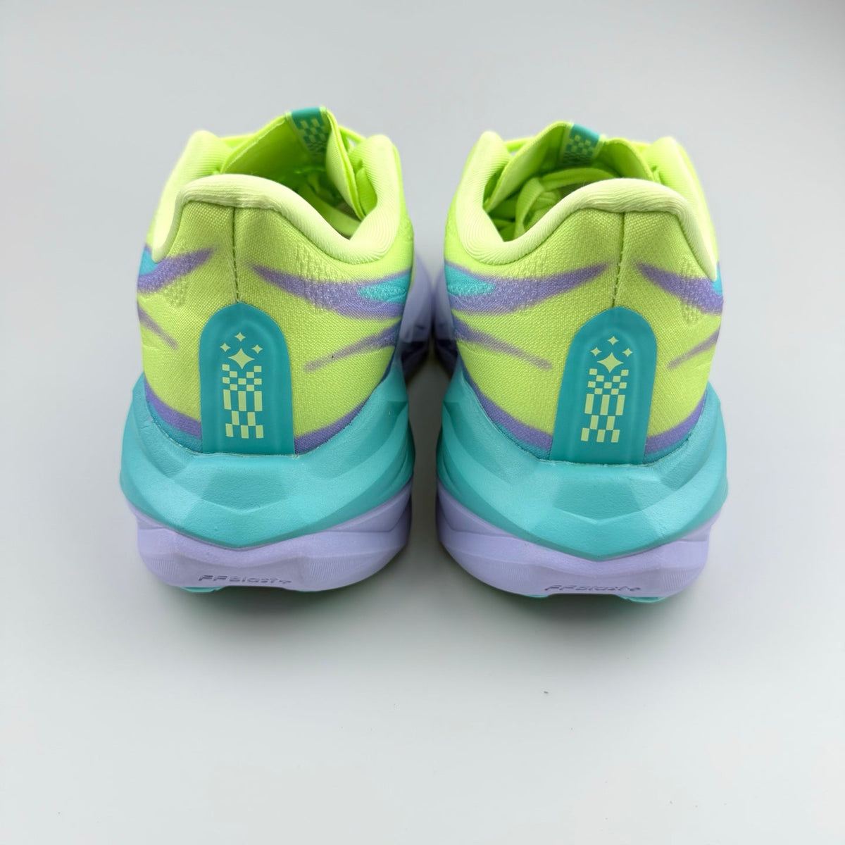 Nike Running Shoes in Volt Green, in Teal and Purple - product image from the listing.