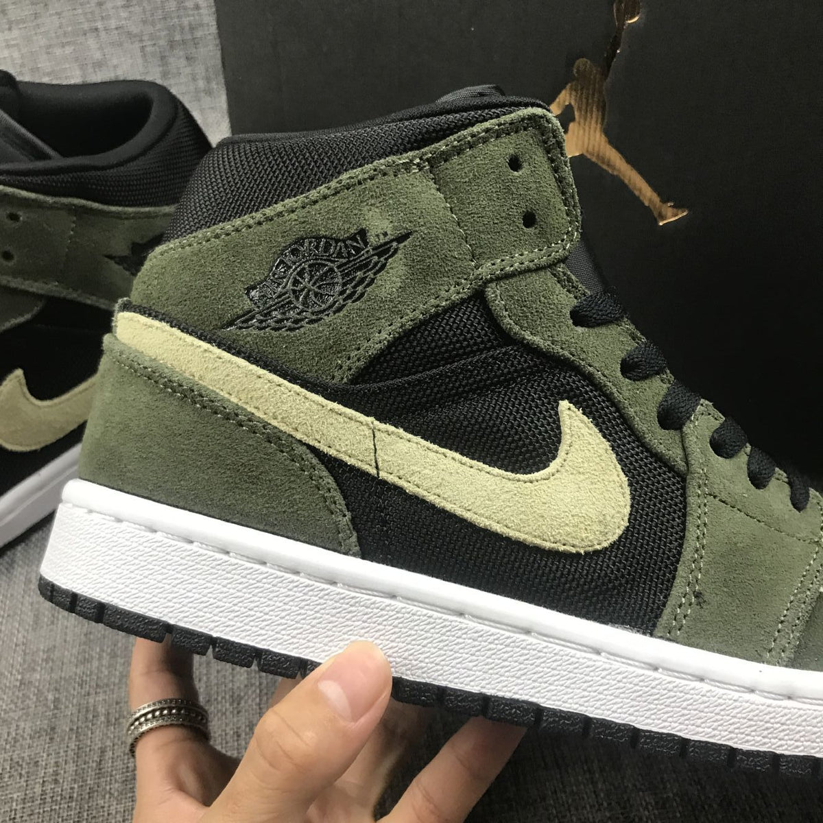 Air Jordan 1 Mid Sneakers in Olive Green BQ6472-030 - product image from the listing.
