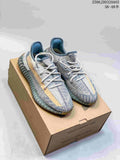 Adidas Yeezy Boost 350 Sneakers in Grey and Tan - product image from the listing.