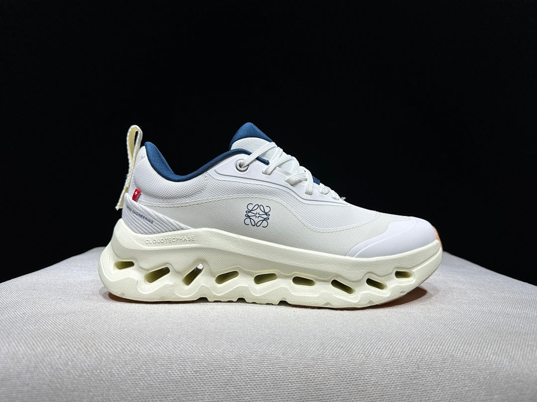 On Cloudtilt 2.0 x LOEWE Sneakers in White Green - product image from the listing.