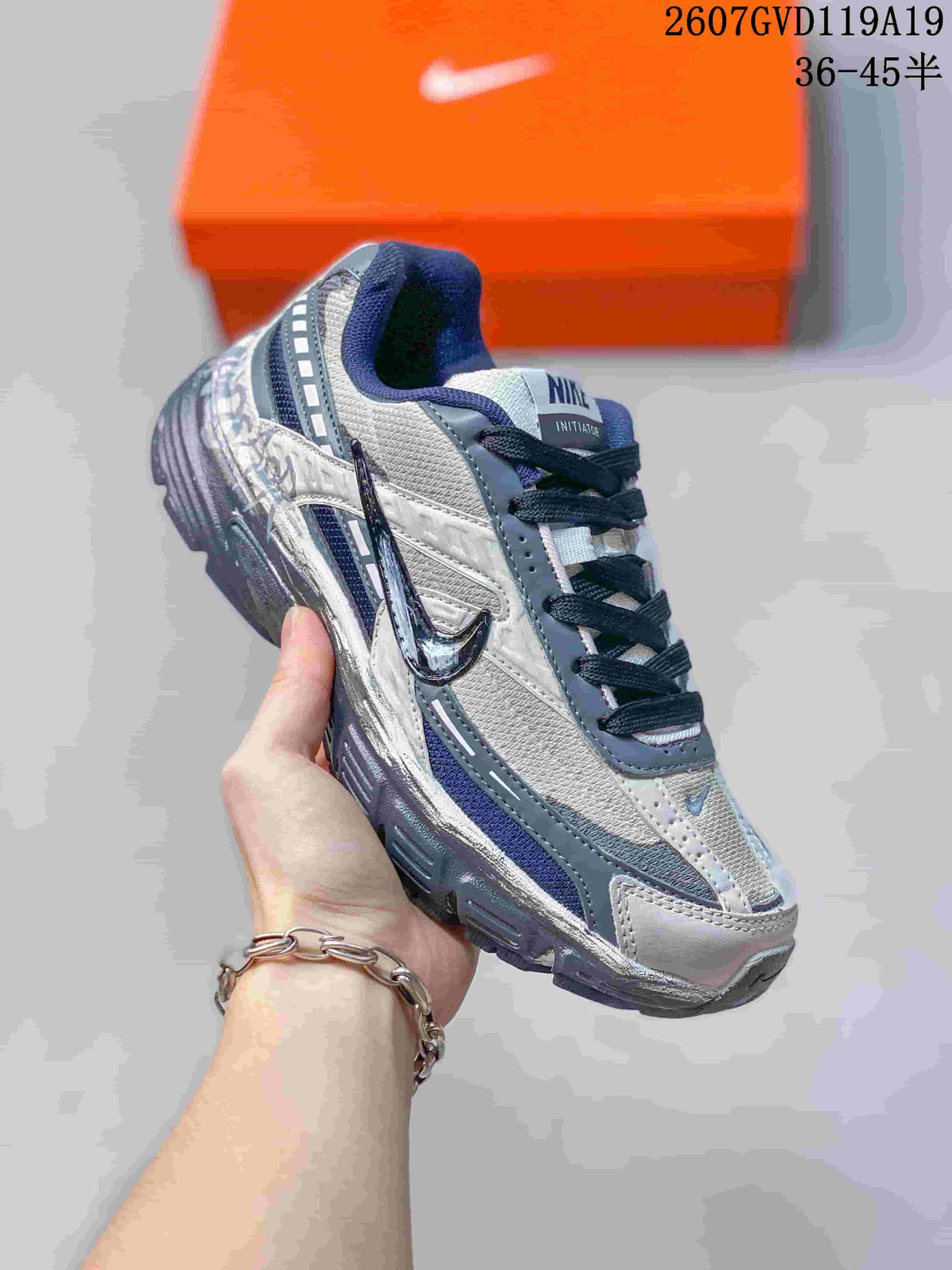 Nike Initiator Sneakers in Black and Grey - product image from the listing.