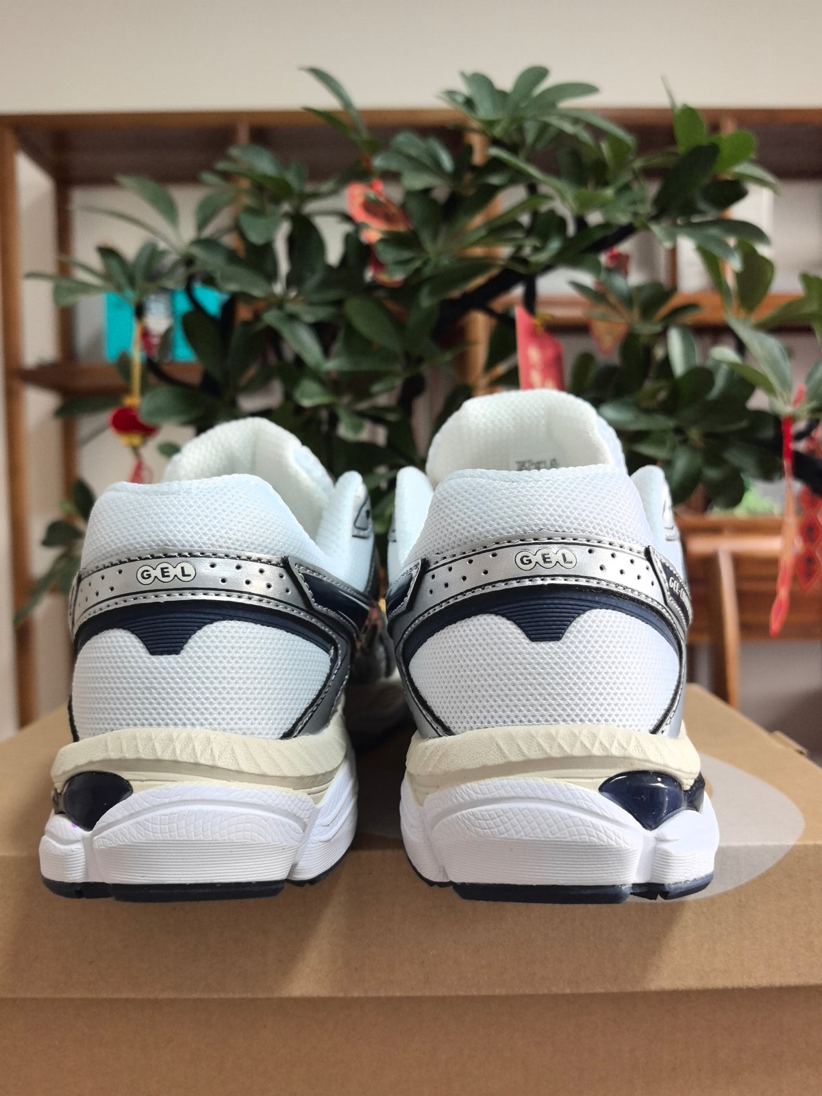 ASICS GEL-Cumulus 16 Sneakers in White Midnight - product image from the listing.