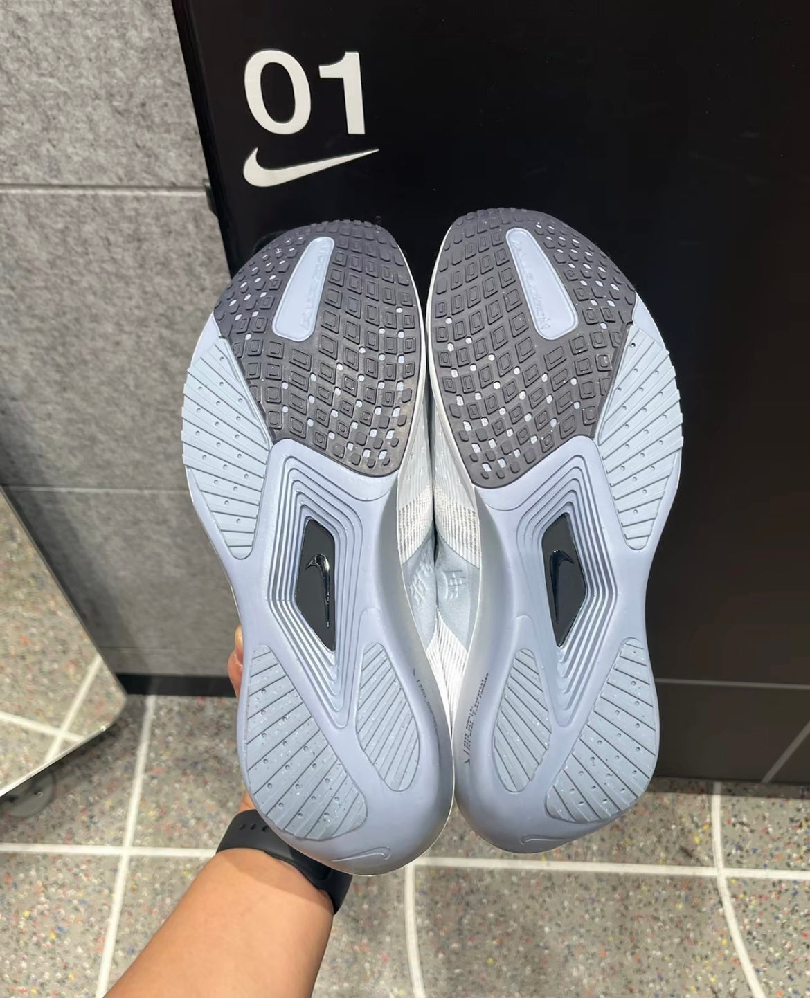 Nike Air Zoom Rival Fly 4 Running Shoes FV6040-102 in Gray White - product image from the listing.
