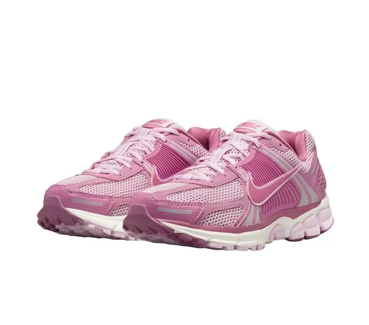 Nike Zoom Vomero 5 Sneakers in Pink and White - product image from the listing.