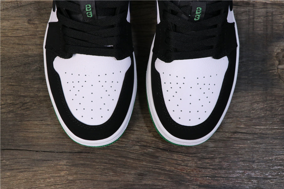 Jordan 1 Low Sneakers in Black Green 553558-113 - product image from the listing.