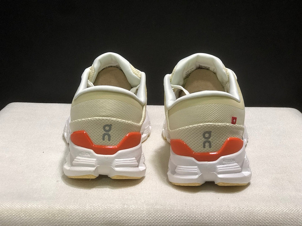 Cream and Orange On Cloud X 4 Sneakers - product image from the listing.
