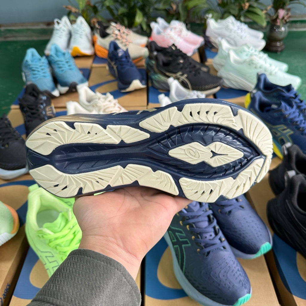 ASICS NOVABLAST 4 Running Shoes, in Blue and Gold - product image from the listing.