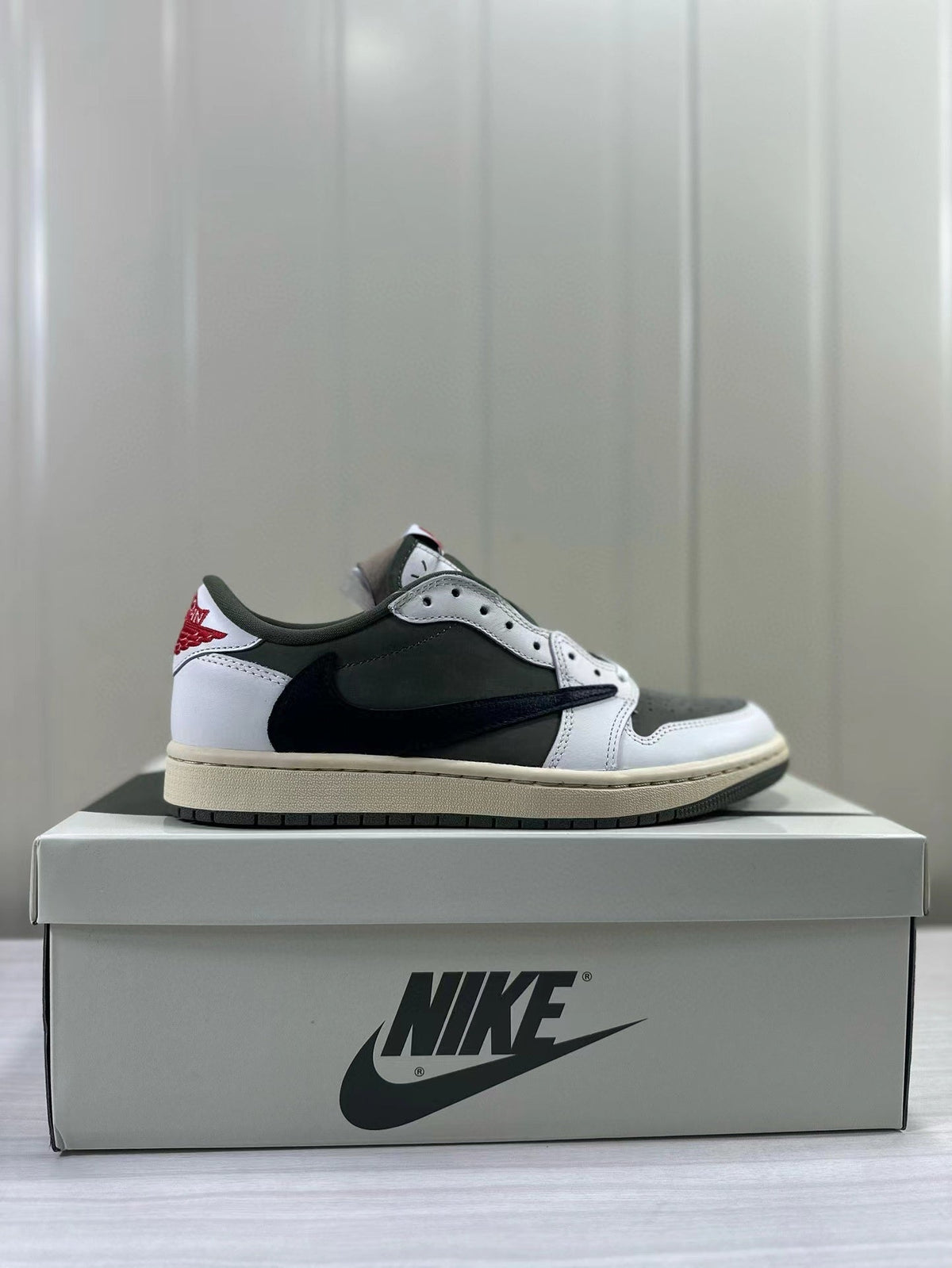Air Jordan 1 Low OG DM7866-200 Sneakers - product image from the listing.