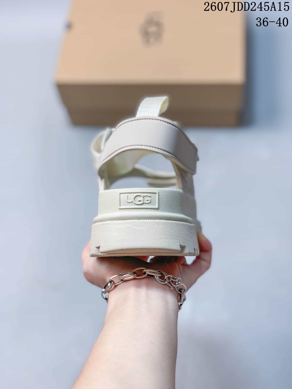 Women's UGG GoldenGlow Platform Sandals in White - product image from the listing.