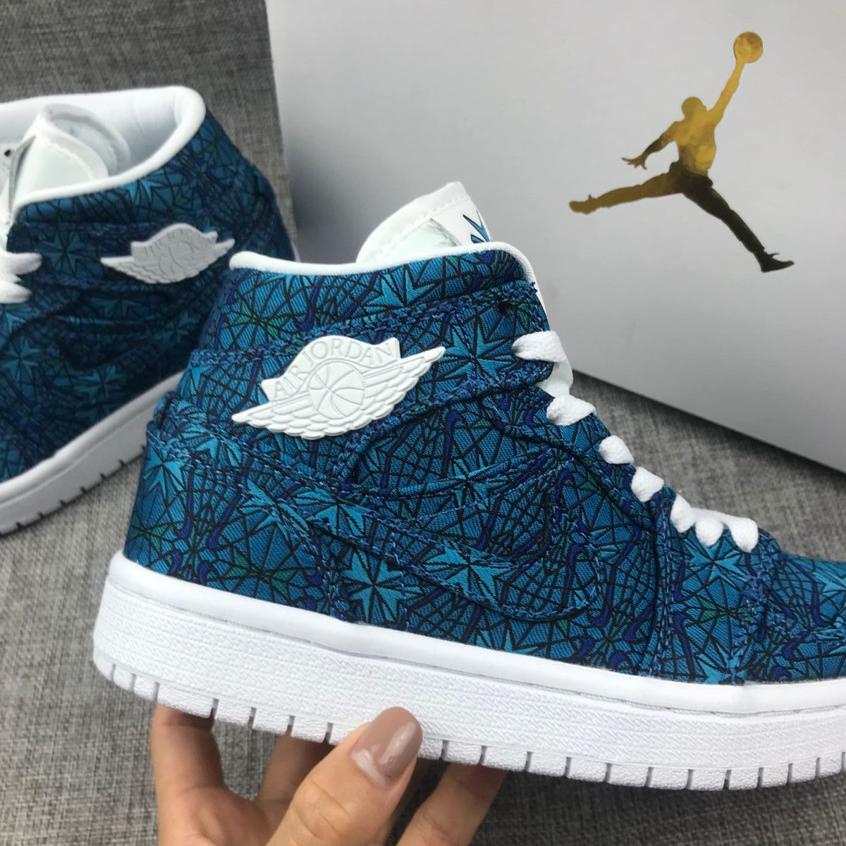 Women's Air Jordan 1 Mid Blue Pattern Sneakers AH7389-300 - product image from the listing.