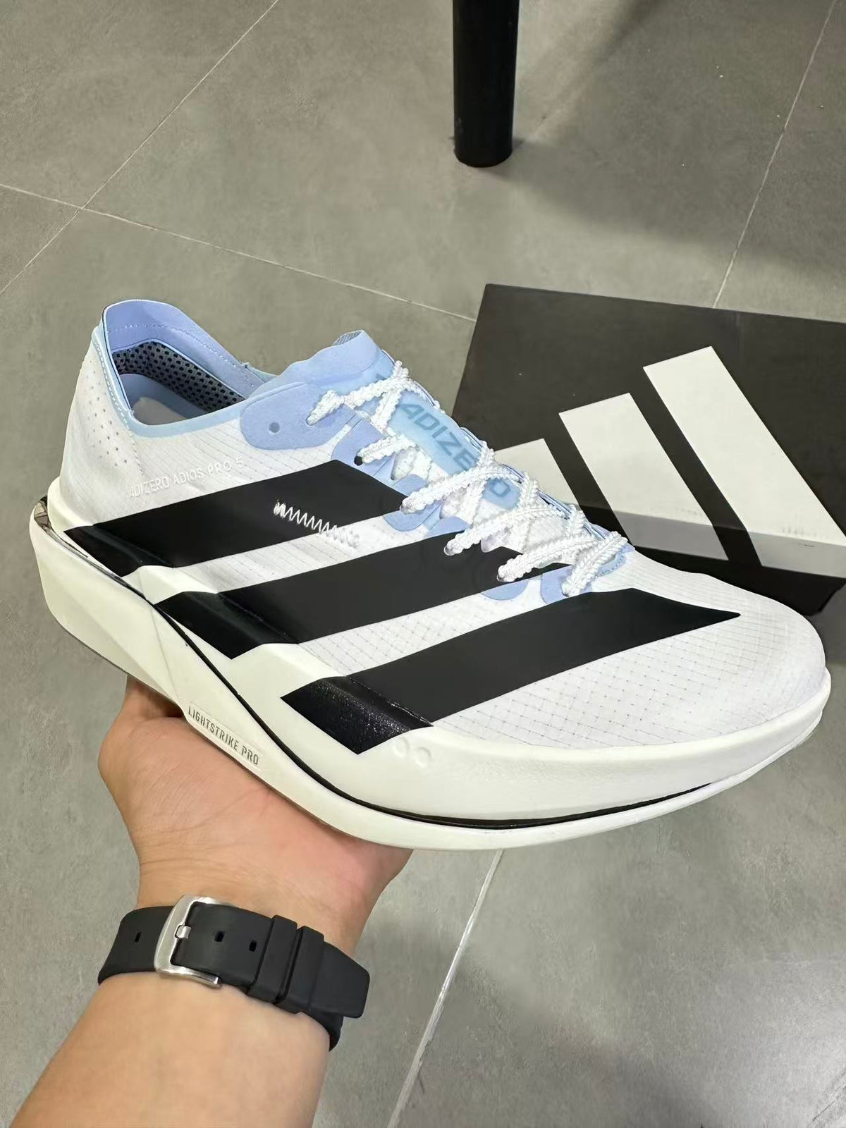 adidas Lightstrike Pro Running Shoes in White Blue KI8298 - product image from the listing.