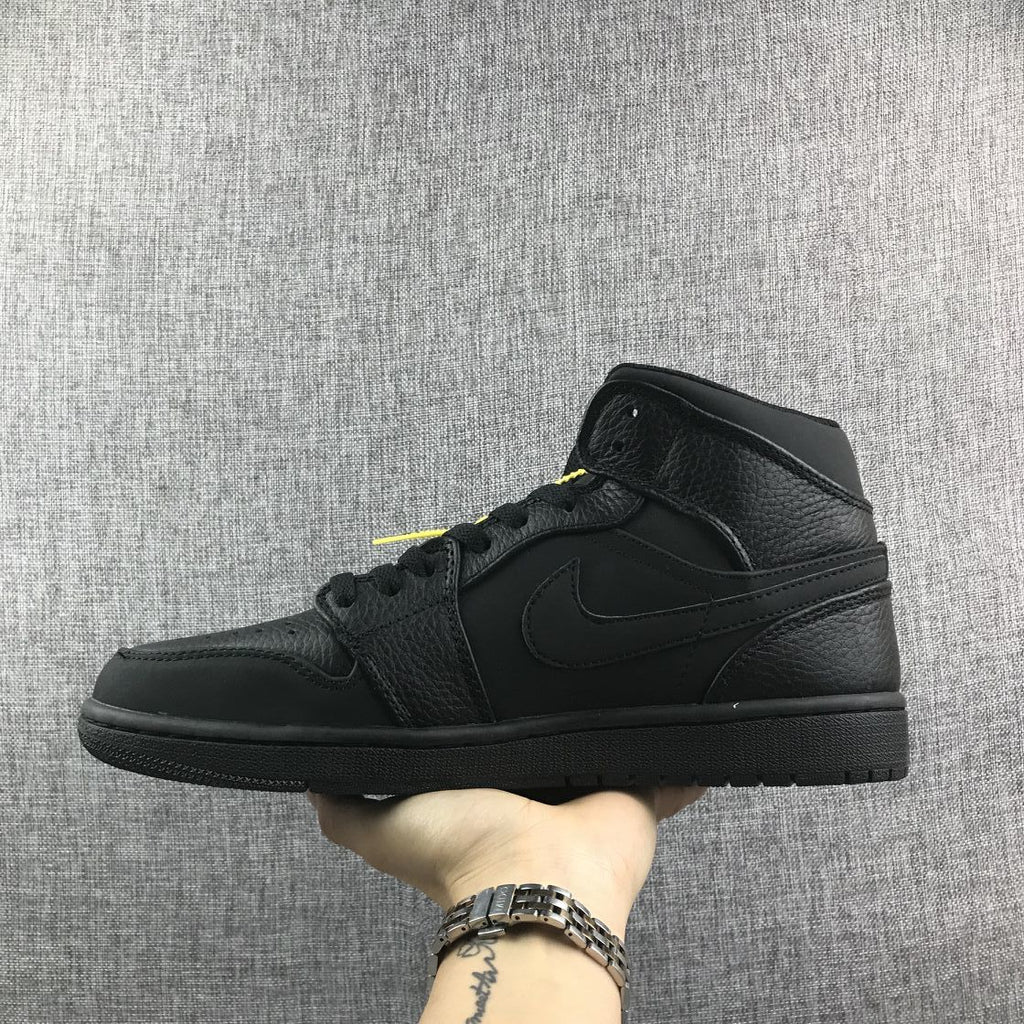 Air Jordan 1 Mid Sneakers, in Black - product image from the listing.