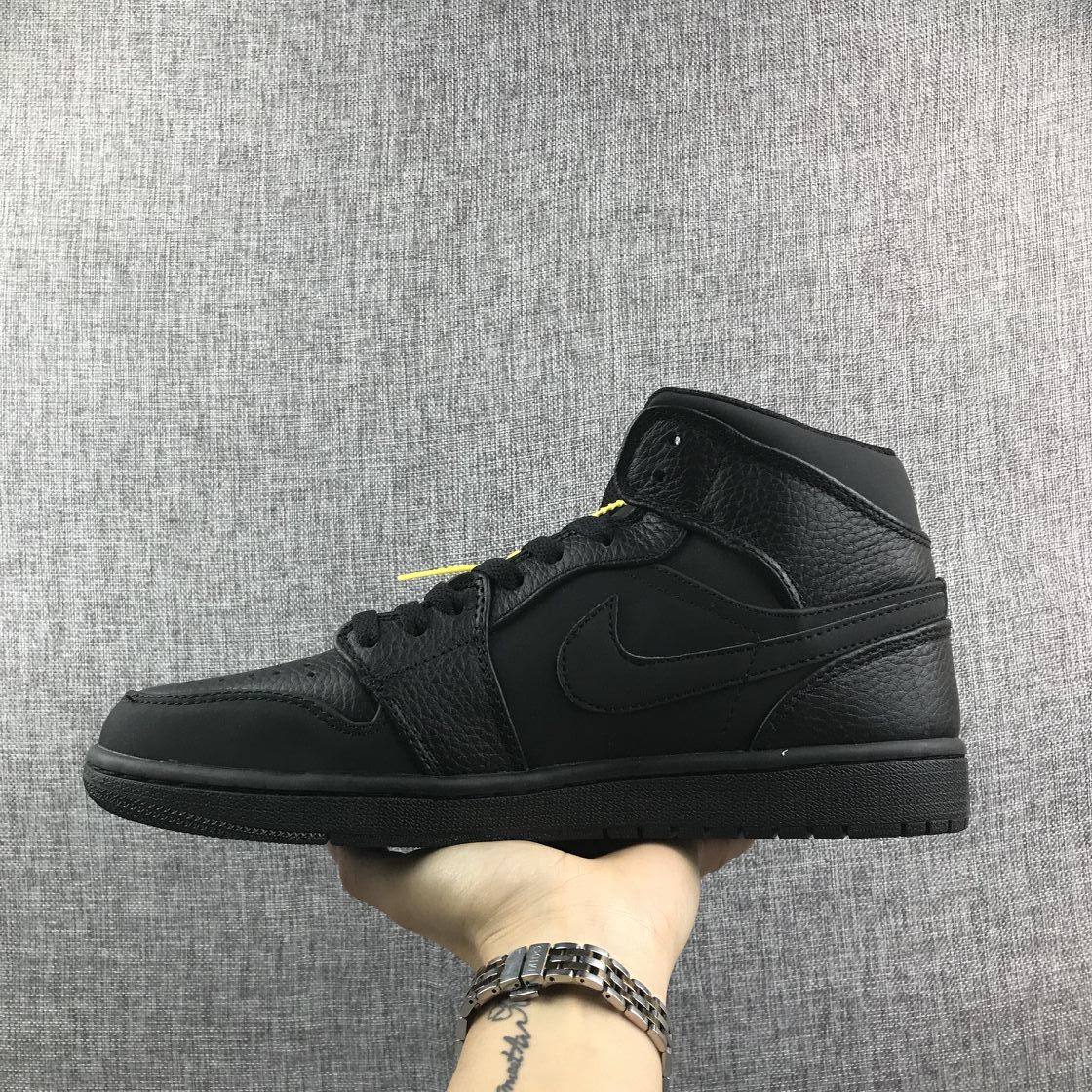 Air Jordan 1 Mid Sneakers, in Black - product image from the listing.