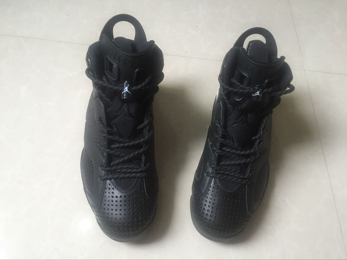 Jordan 6 Retro Black Cat High-Top Sneakers in Black and White - product image from the listing.