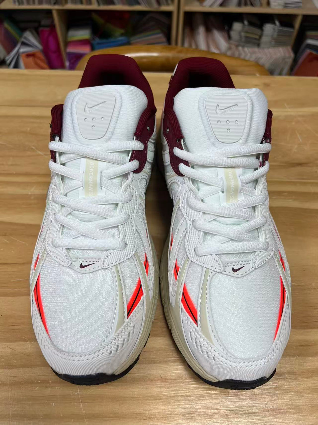 Nike P-9000 Sneakers in White and Burgundy IZ4751-100 - product image from the listing.