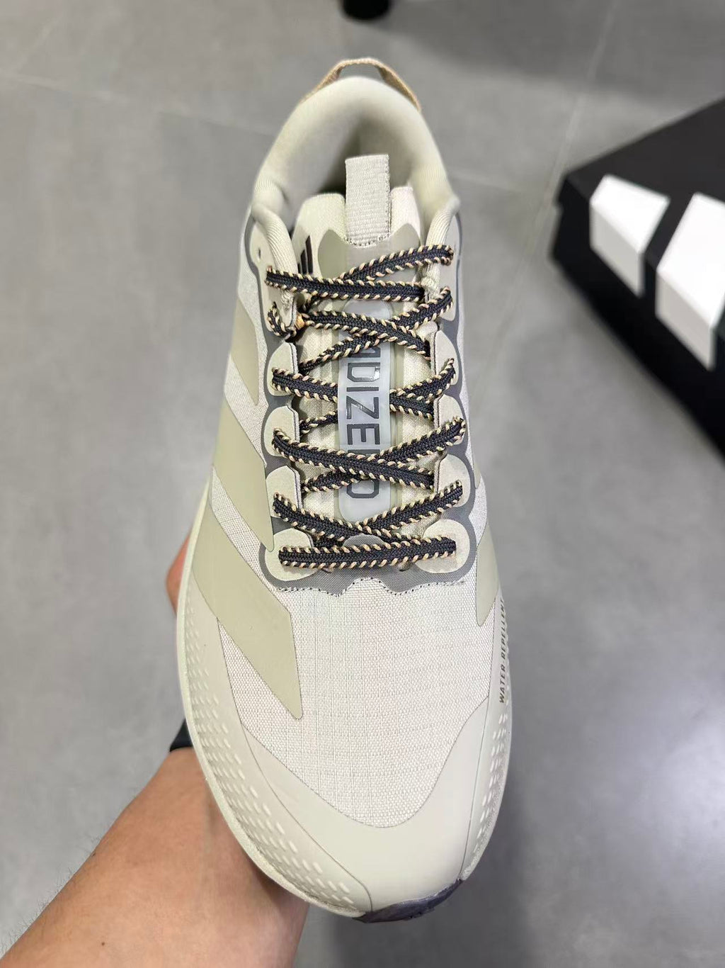 Adizero EVO SL ATR Running Shoes, in Light Brown - product image from the listing.