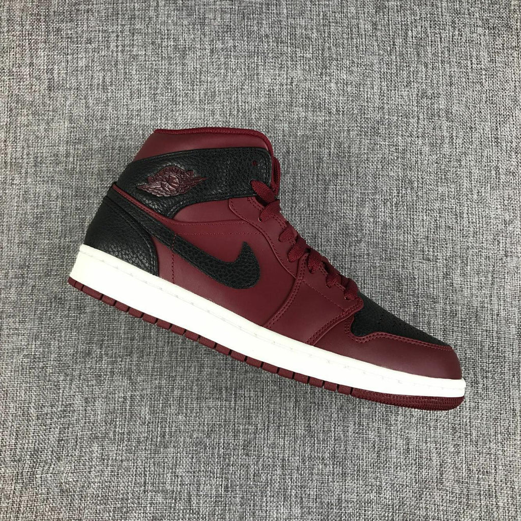 Air Jordan 1 Mid Sneakers in Black and Burgundy 554724-601 - product image from the listing.