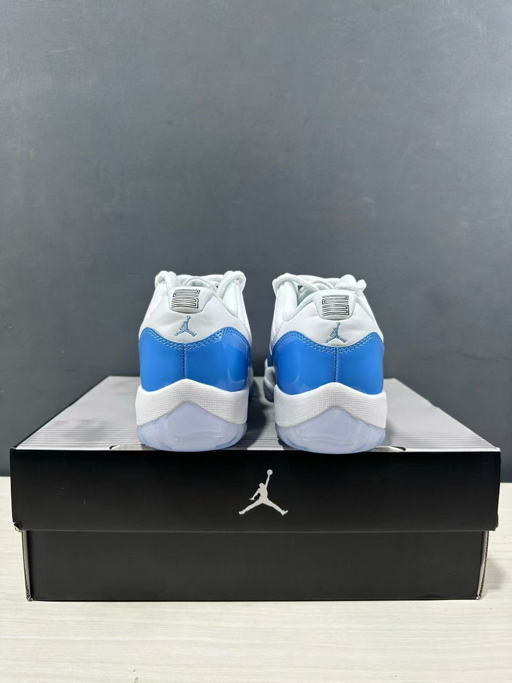 Air Jordan 11 Retro Low UNC Blue Sneakers FV5104-100 - product image from the listing.
