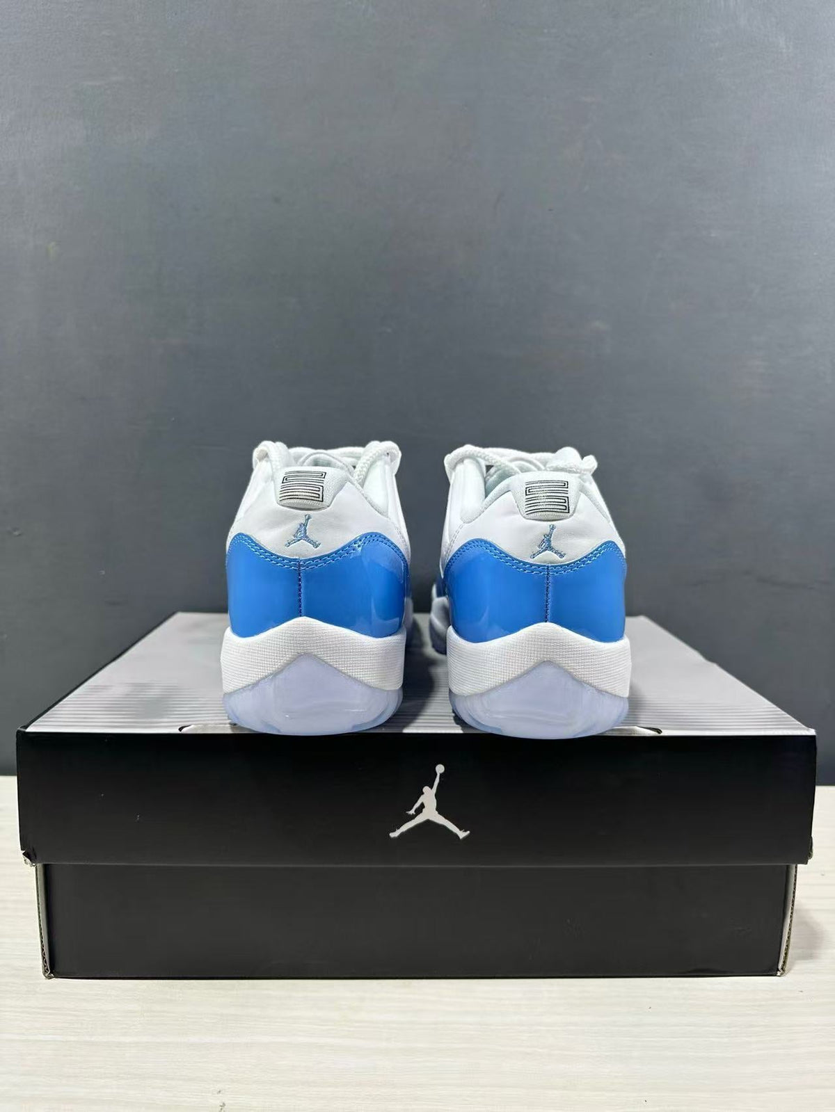 Air Jordan 11 Retro Low UNC Blue Sneakers FV5104-100 - product image from the listing.