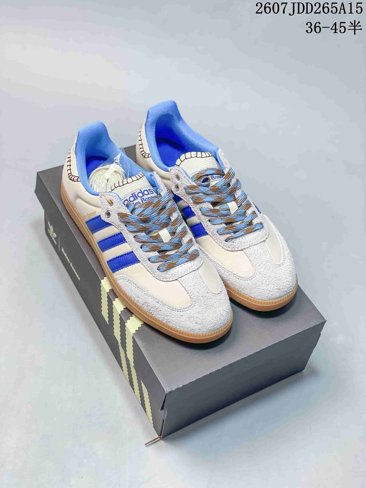 adidas Samba Leather Low-Top Sneakers in White/Blue and in Pink - product image from the listing.