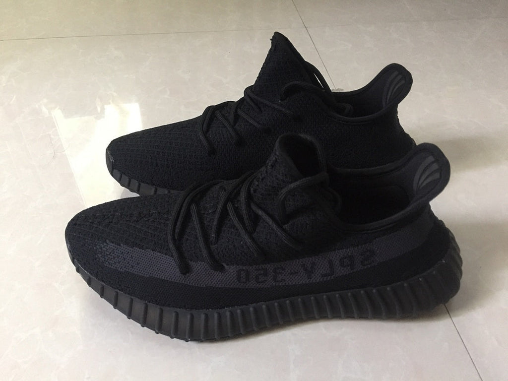 Adidas Yeezy Boost 350 V2 Sneakers in Black Knit - product image from the listing.
