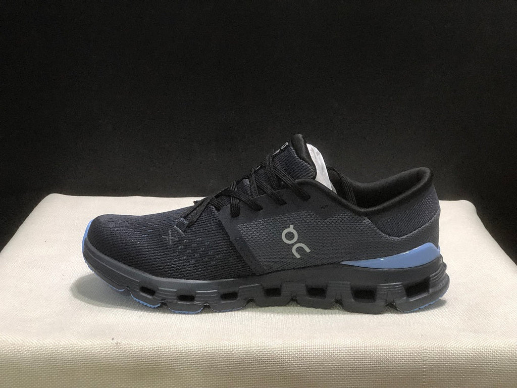 On Cloud X 4 Running Sneakers in Navy - product image from the listing.