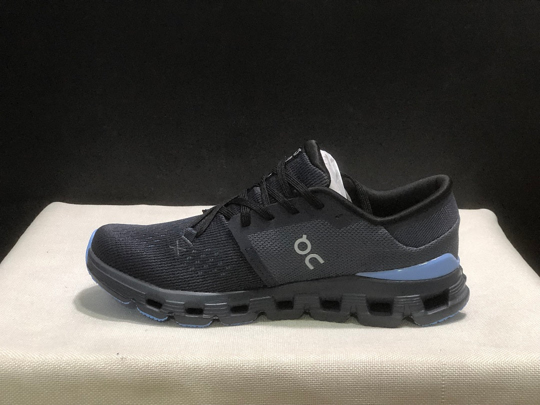 On Cloud X 4 Running Sneakers in Navy - product image from the listing.