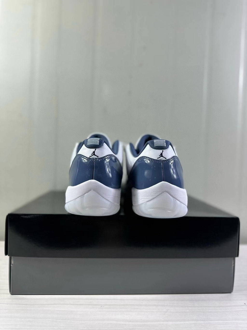 Air Jordan 11 Low Diffused Blue Sneakers FV5104-104 - product image from the listing.