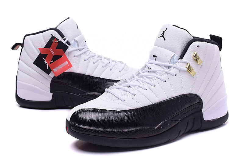 Air Jordan 12 Retro White and Black High-Top Sneakers - product image from the listing.