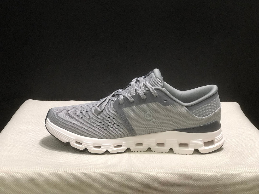 On Cloud X 4 Sneakers in Alloy and in Ivory - product image from the listing.