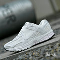 Nike Air Zoom Vomero 5 Running Sneakers in White - product image from the listing.
