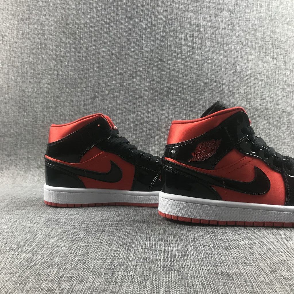 Air Jordan 1 Mid Sneakers in Black Red White BQ6472-600 - product image from the listing.