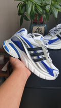 White and Blue Mesh Trainers with Black Side Stripes - product image from the listing.