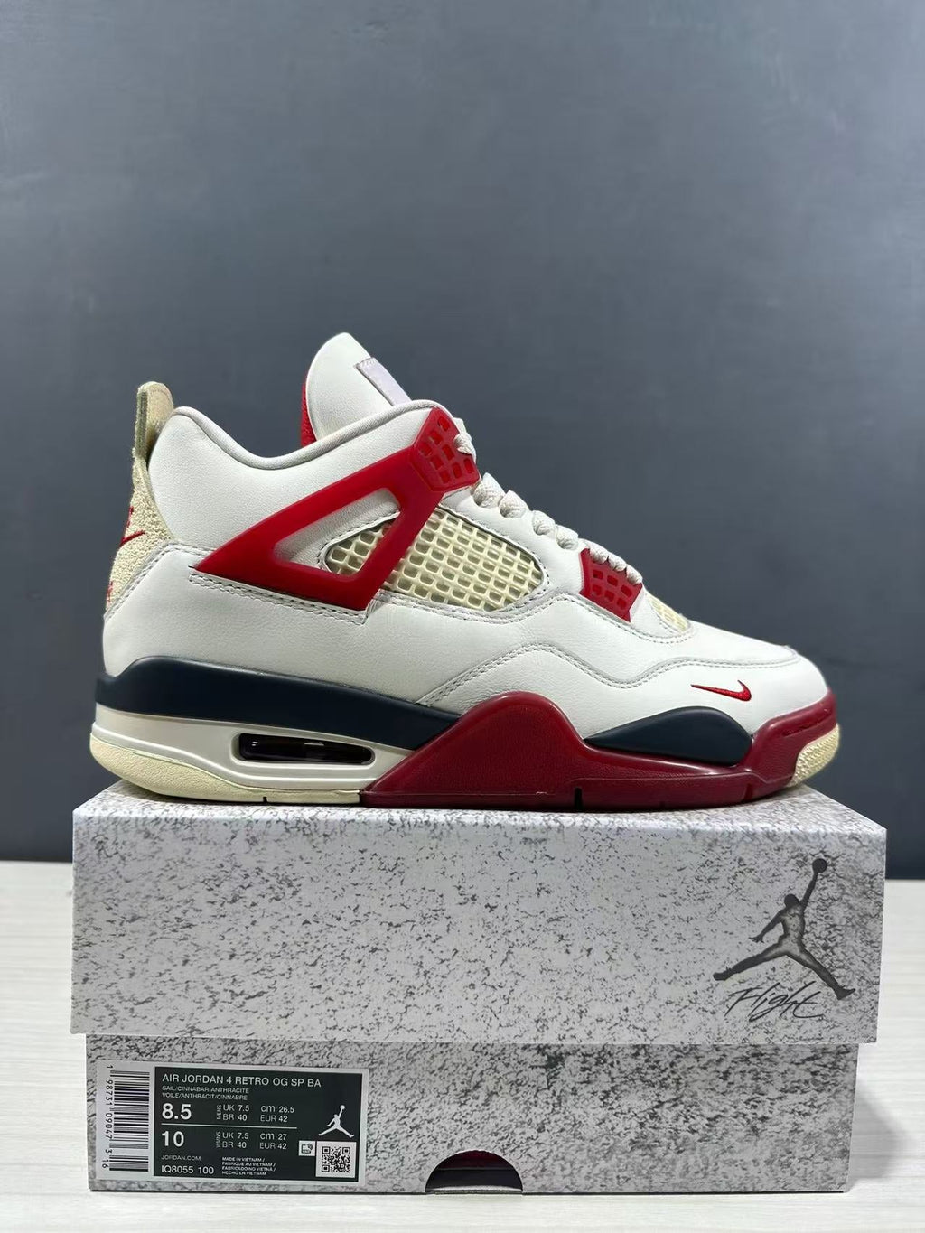 Air Jordan 4 Retro White Red Sneakers - product image from the listing.