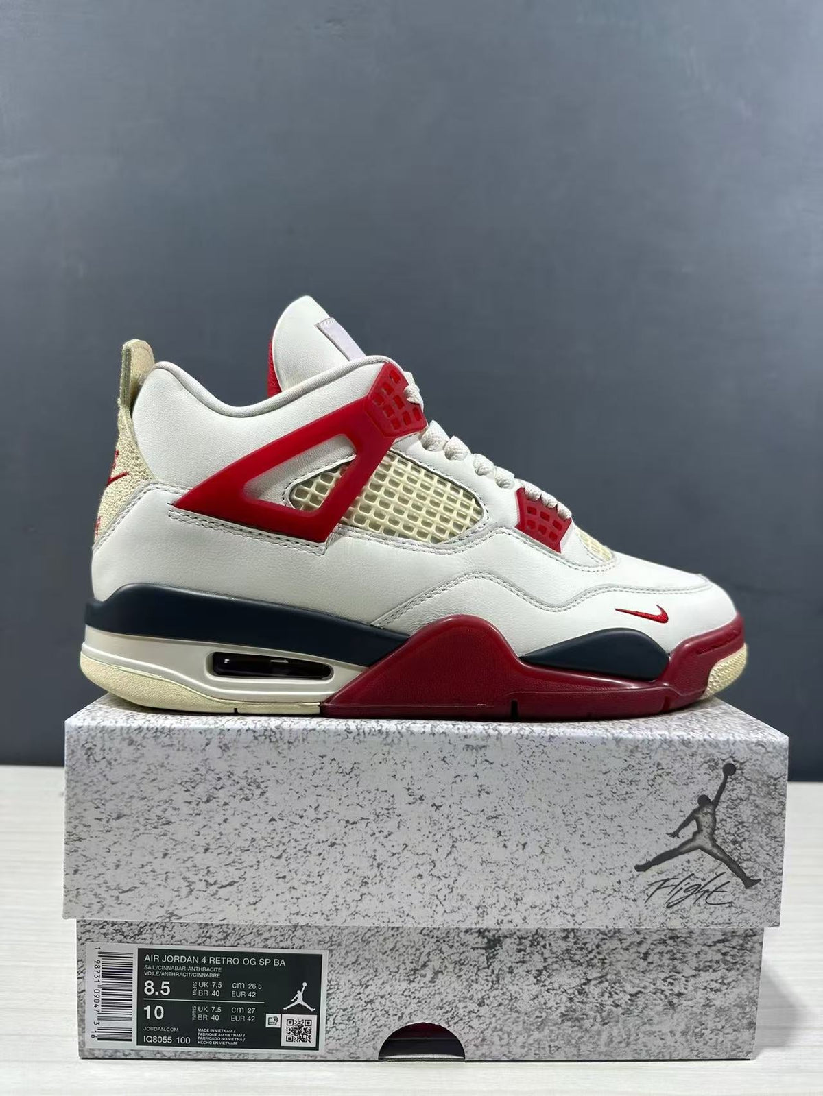 Air Jordan 4 Retro White Red Sneakers - product image from the listing.