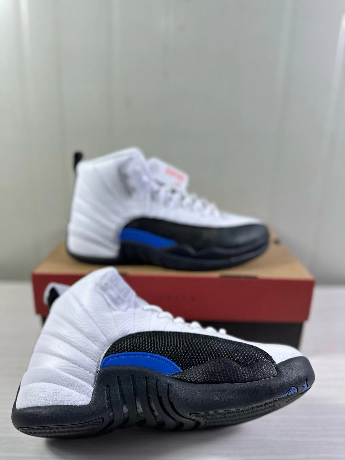 Air Jordan 12 Retro White Black Game in Royal CT8013-140 - product image from the listing.