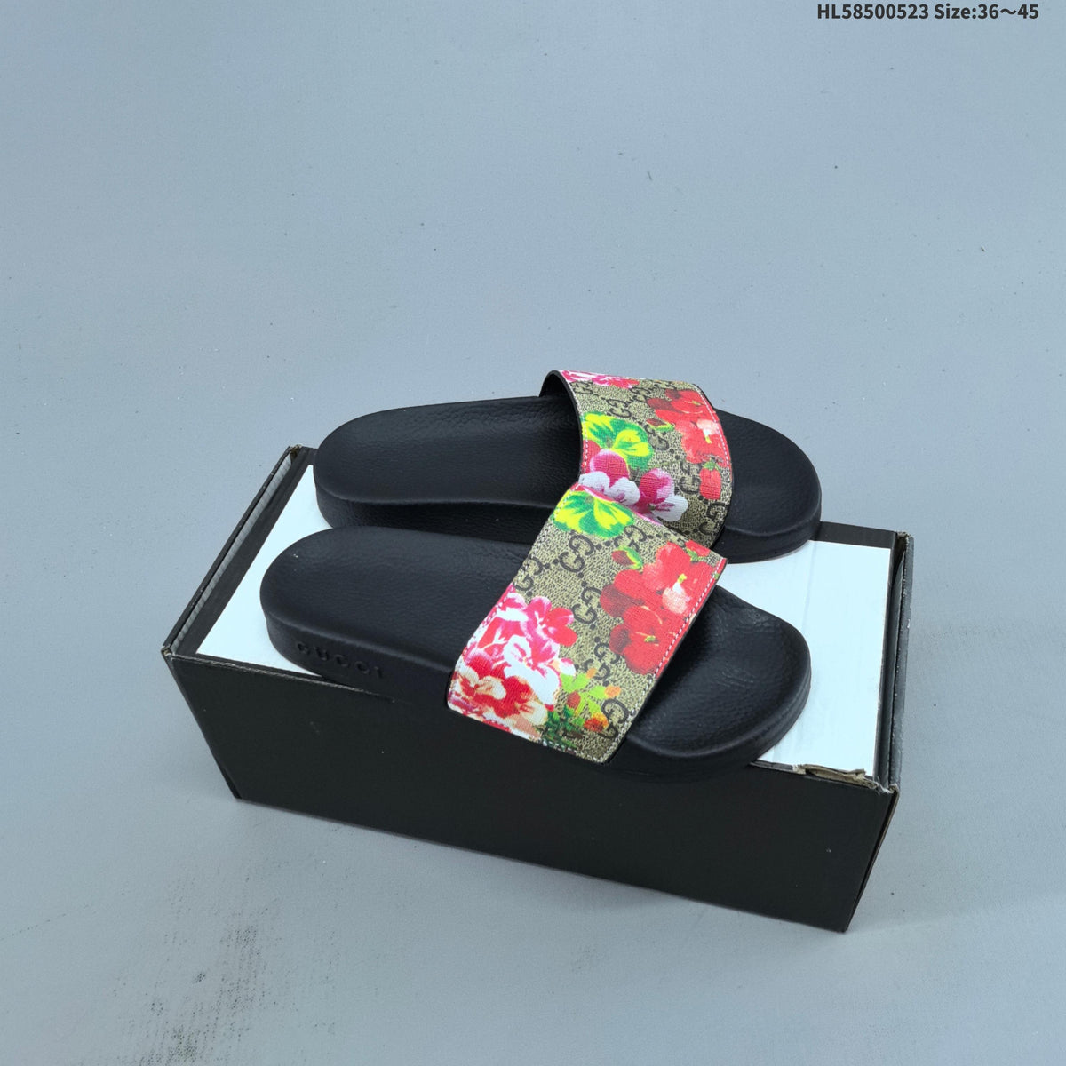 HL58500523 Monogram Slide Sandals by Gucci - product image from the listing.
