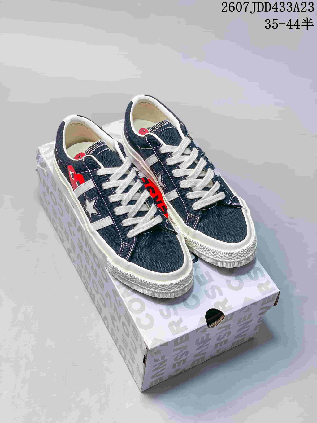 CDG Play x Converse One Star Academy Pro Sneakers in Navy White - product image from the listing.