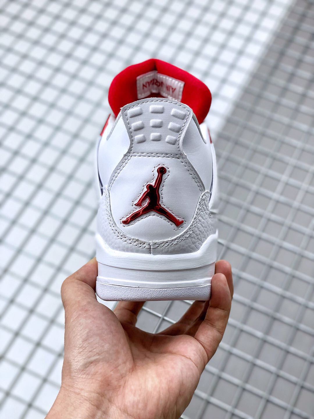 Air Jordan 4 Red Metallic White Red Sneakers - product image from the listing.