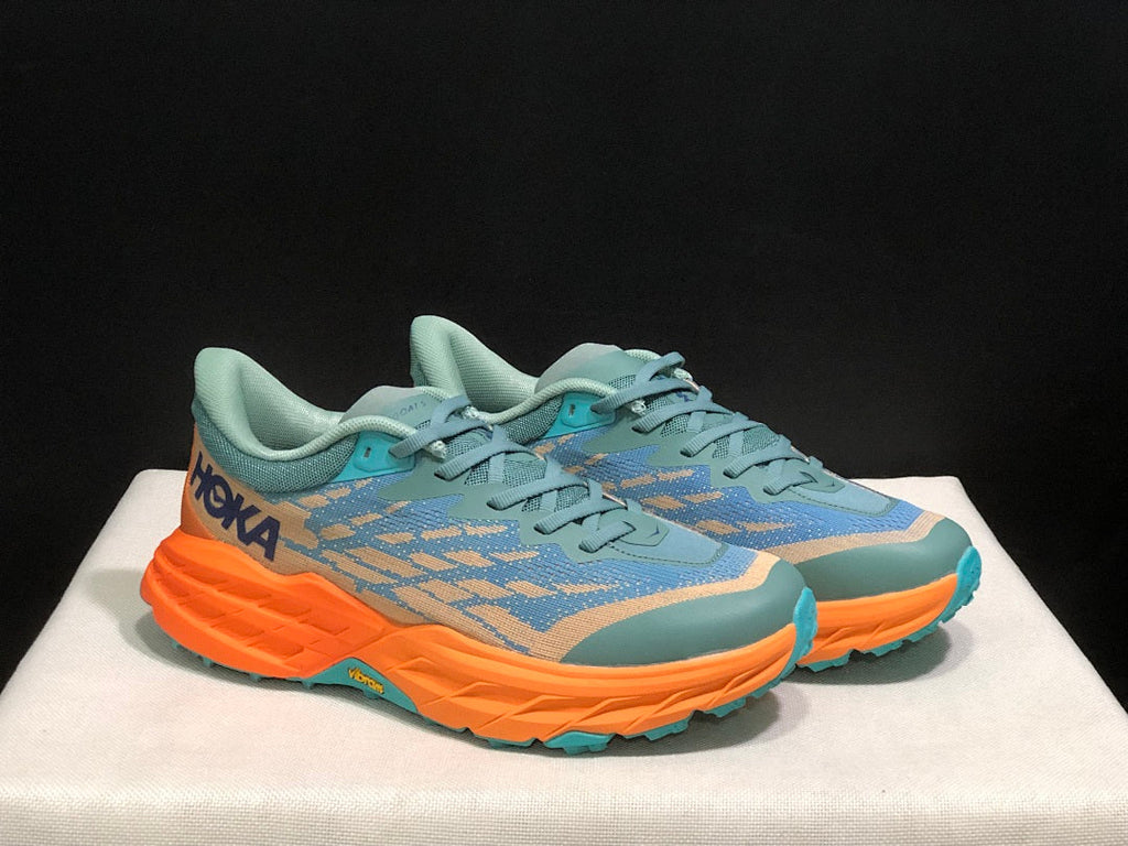 HOKA Speedgoat 5 Trail Running Shoes in Blue Orange - product image from the listing.