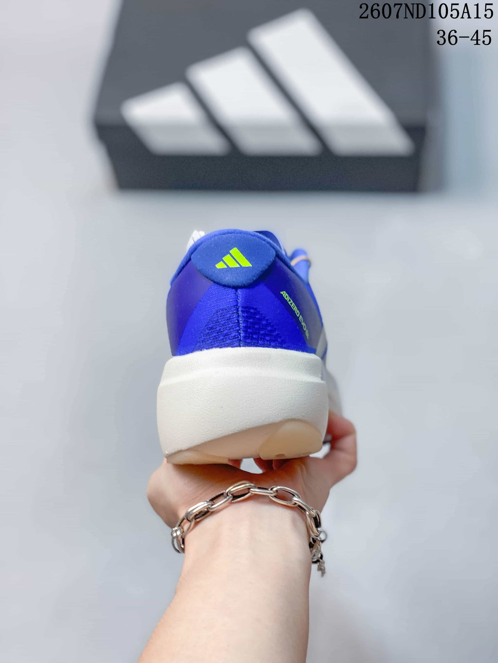 Adidas Adizero Evo SL Running Sneakers in Blue White 2607ND105A15 - product image from the listing.