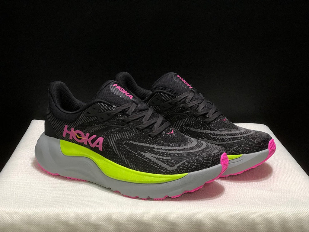 HOKA Arahi 8 Running Shoes, Black and Neon in Yellow - product image from the listing.