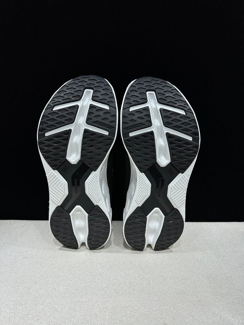 On CloudEclipse Running Shoes in Black and White - product image from the listing.