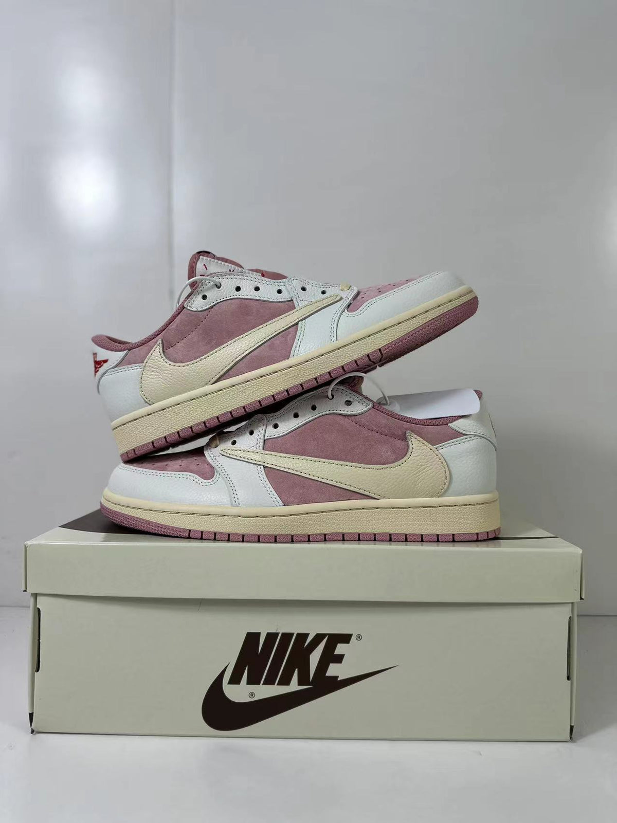 Nike Air Jordan 1 Low Travis Scott in White Pink DM7866-600 - product image from the listing.