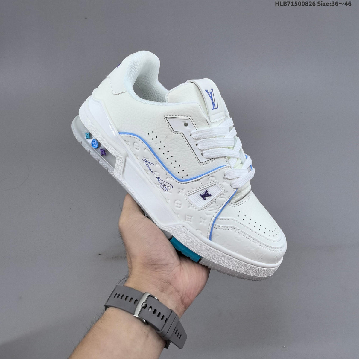 Louis Vuitton White Low-Cut Sneakers with Blue Accents - product image from the listing.