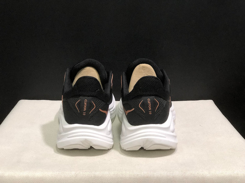 HOKA Clifton 10 Running Shoes, in Black and White - product image from the listing.