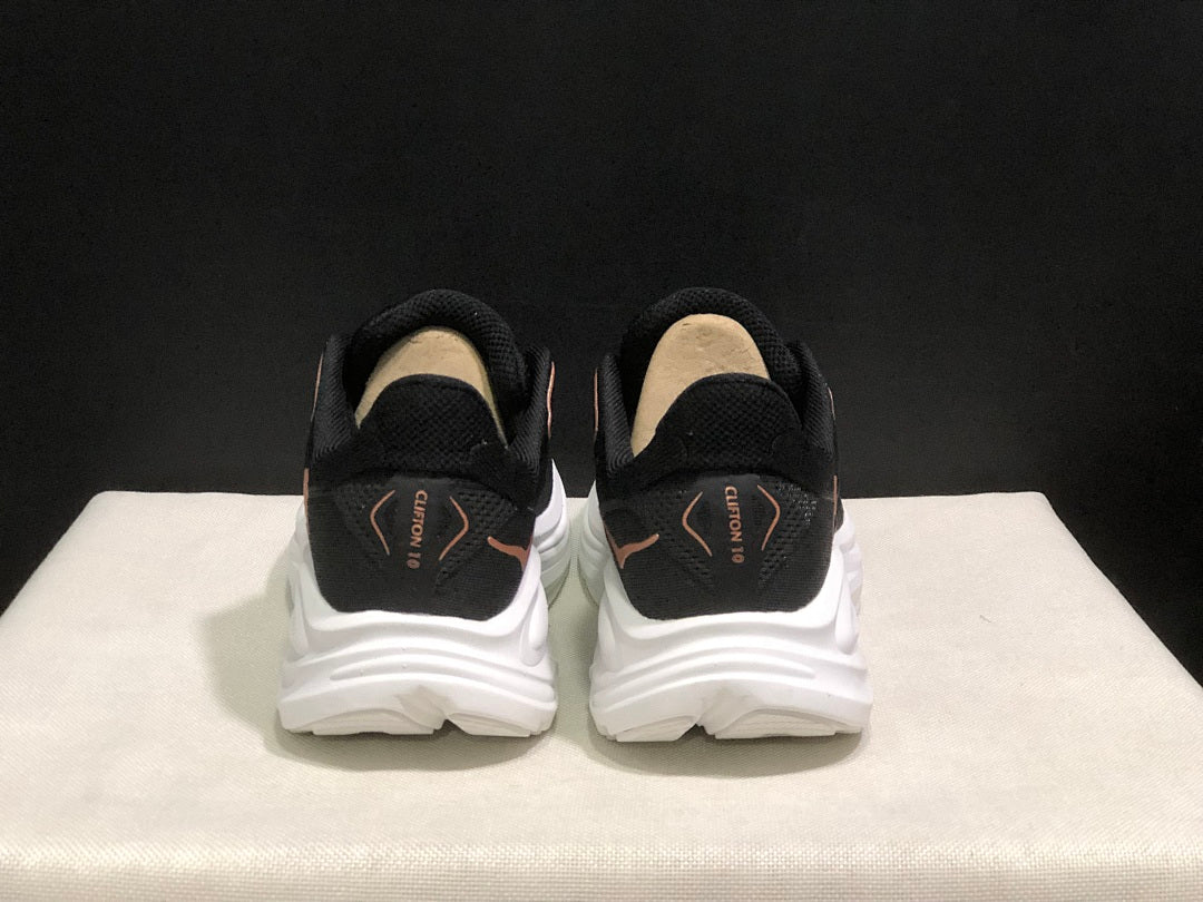 HOKA Clifton 10 Running Shoes, in Black and White - product image from the listing.